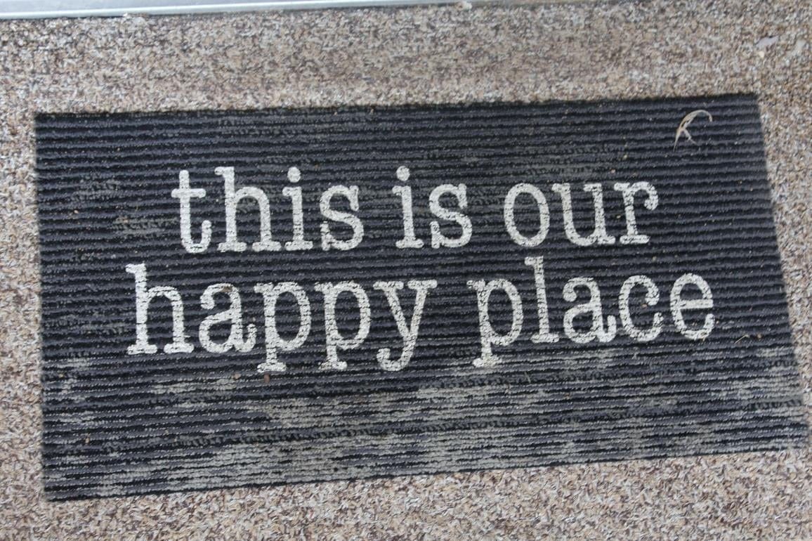 The doormat at the end of the trip: this is our happy place
